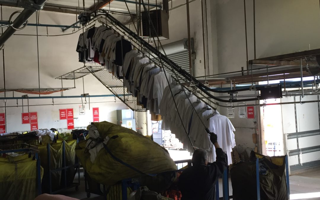 Railex System 211 Trolley Booster bringing down delivery route by the van load from overhead storage rails