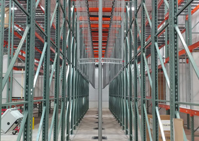 Railex System 742 Two-Tier Garment Storage Conveyor in High Value Commercial Storage Facility – Front View